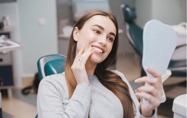 Dental teeth whitening woman